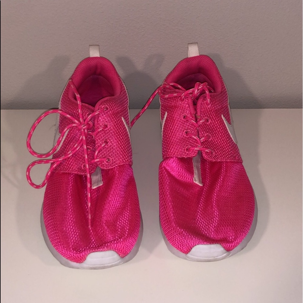 Hot pink nike shoes